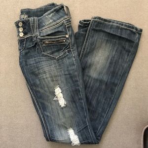 Distressed bell bottom jeans